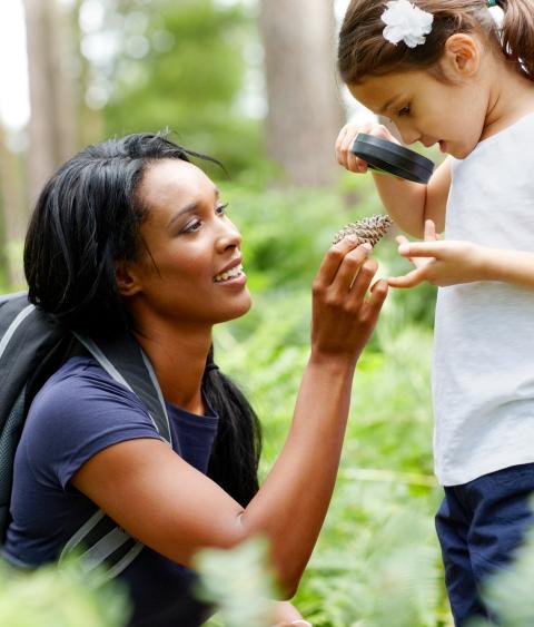 Girl and mentor exploring nature