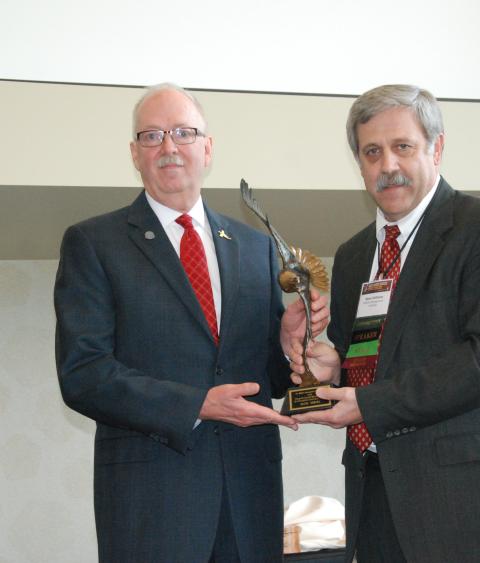 Steve Williams (right) presenting David Nomsen with the Grinnell Award, Credit: Dave Windsor