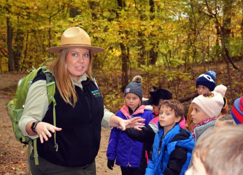 Indiana DNR staff leads chiildren on a field trip