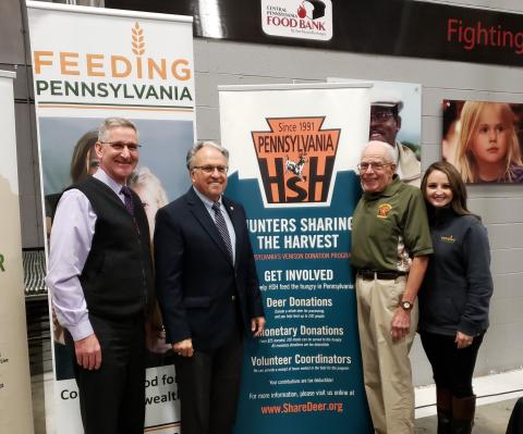 Hunters Sharing the Harvest display at a conference