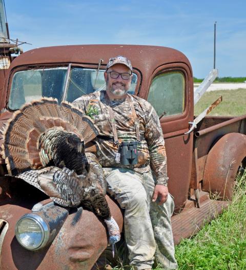 Leo Miranda-Castro with harvested turkey