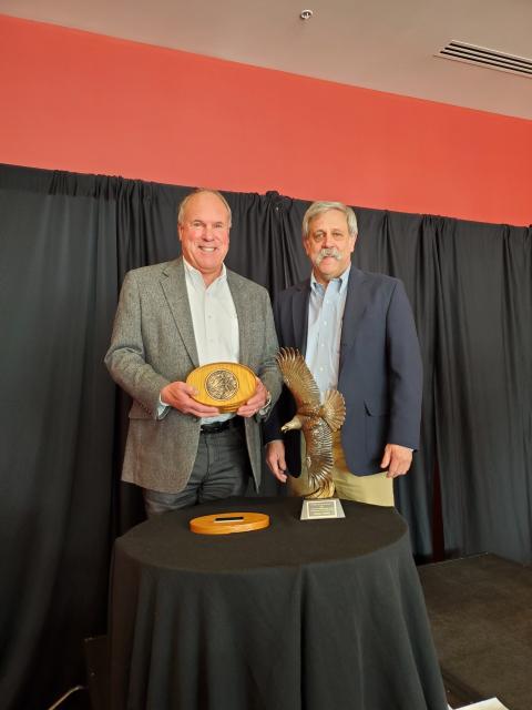 Steve Williams presents Grinnell Award to Charles Wooley